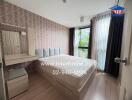 Modern bedroom with double bed and desk