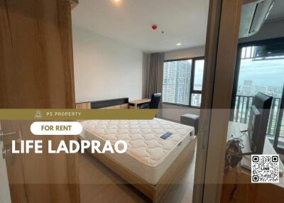 Modern furnished bedroom with window view in Life Ladprao