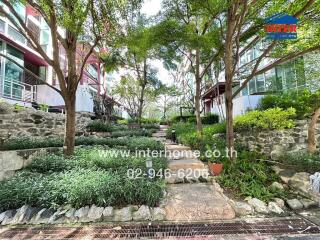 Beautiful garden area with lush greenery and trees