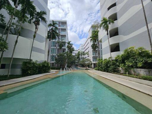 Modern residential building complex with swimming pool