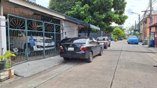 street view with parked cars