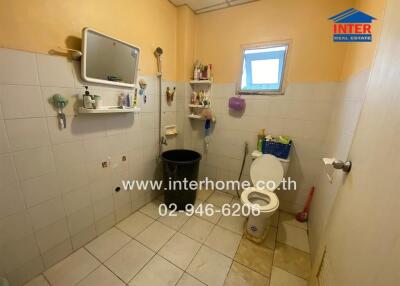 Bathroom with amenities and fixtures