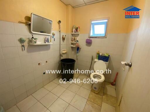 Bathroom with amenities and fixtures