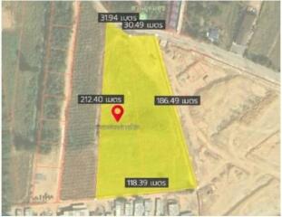 Aerial view of a plot of land with boundary measurements