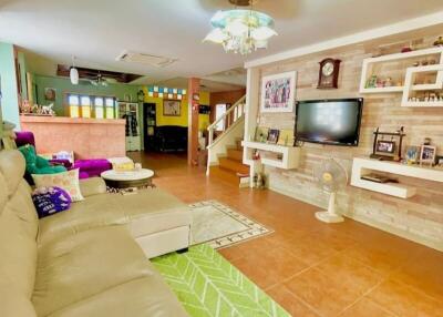 Spacious and well-decorated living room with modern amenities