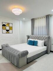Luxurious bedroom with modern decor and elegant furnishings