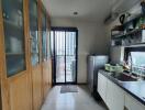 Modern kitchen with balcony view