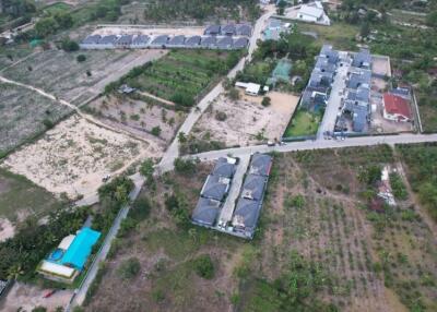 Aerial view of residential and agricultural land