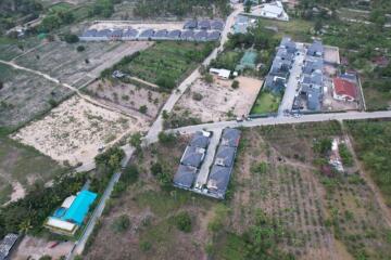 Aerial view of residential and agricultural land