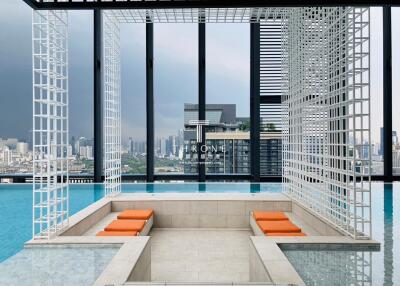 Modern rooftop pool area with city view