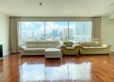 modern living room with large windows and city view