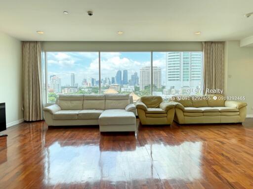 modern living room with large windows and city view