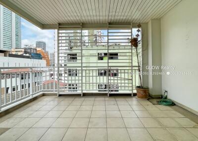 Spacious balcony with tile flooring and city view