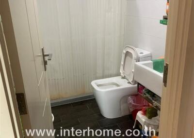 Bathroom with a toilet and shower