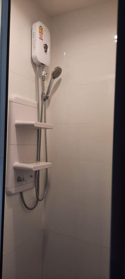 Shower area with shelves and water heater