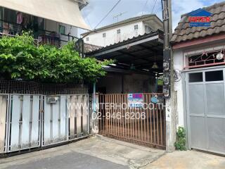 Front view of a residential building with a garage