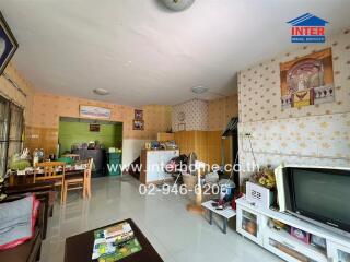 Living room with dining area and kitchen