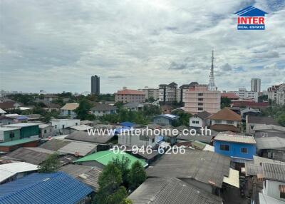 View of a neighborhood with various buildings and houses