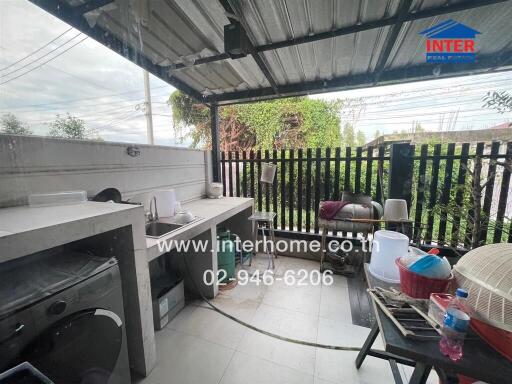 Outdoor kitchen with sink and countertop