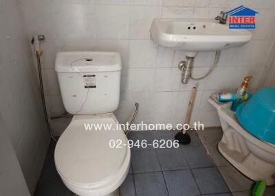 simple bathroom with toilet and sink
