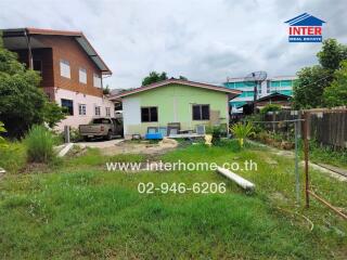 Front yard view with house and surroundings