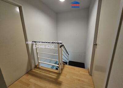 Indoor staircase with wooden flooring