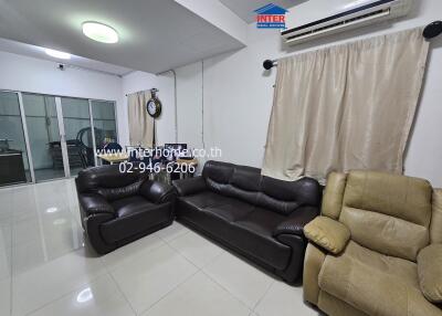 Living room with sofas and air conditioner