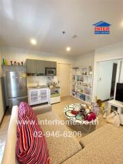 Cozy living room with an open kitchen