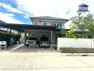 Exterior view of a modern house with a carport