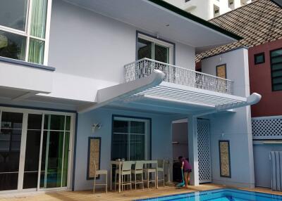 Modern two-story house with pool and patio