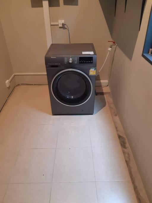 Laundry room with washer