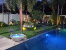 Beautifully landscaped backyard with a pool and garden at dusk