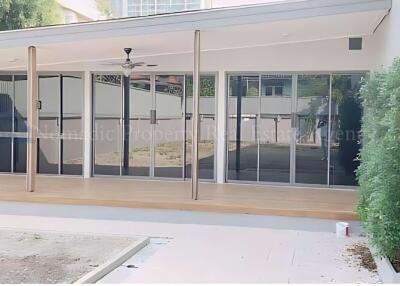 Modern outdoor patio area with glass sliding doors