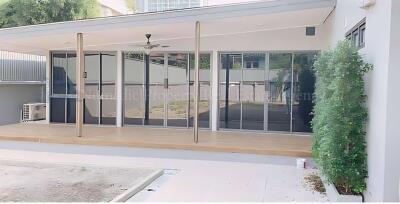 Modern outdoor patio area with glass sliding doors