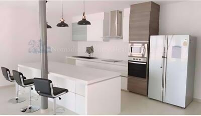 Modern kitchen with island and appliances