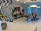 Modern dining area with artistic wall paint and large dining table