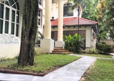 Front view of a residential house with a well-maintained garden