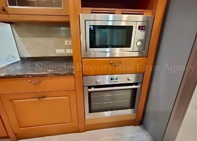 Cozy kitchen equipped with modern appliances.