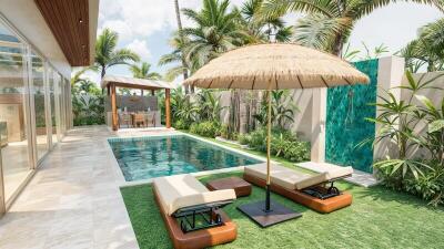 Outdoor pool area with lounge chairs, umbrella, and tropical landscaping