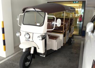 Tuk-tuk parked in a parking area