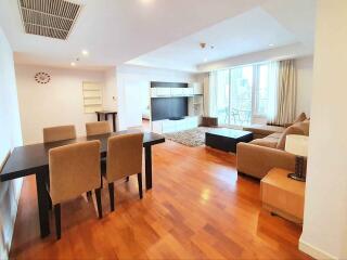 Spacious living and dining area featuring hardwood floors