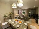 Modern living and dining area with a set dining table and cozy seating