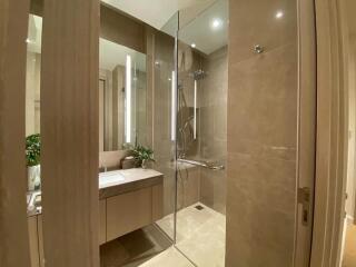 Modern bathroom with a glass-enclosed shower and vanity