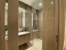 Modern bathroom with a glass-enclosed shower and vanity