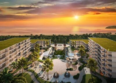 Arial view of luxury beachfront apartments at sunset