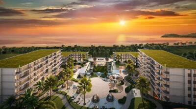 Arial view of luxury beachfront apartments at sunset