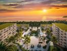 Arial view of luxury beachfront apartments at sunset