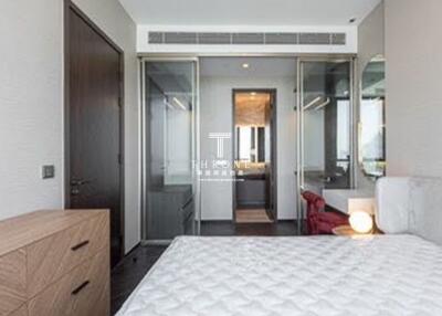 Modern bedroom with ensuite bathroom and large window