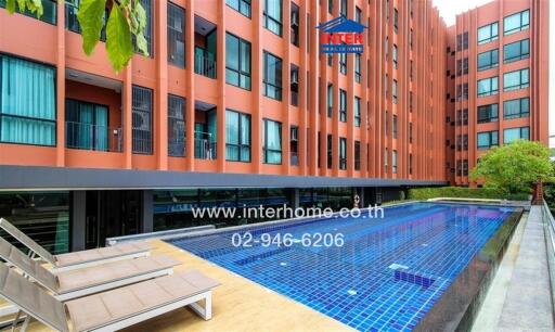 Modern apartment building with an outdoor swimming pool