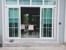 Sliding glass doors with view of indoor dining area